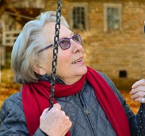 Older woman on a swing